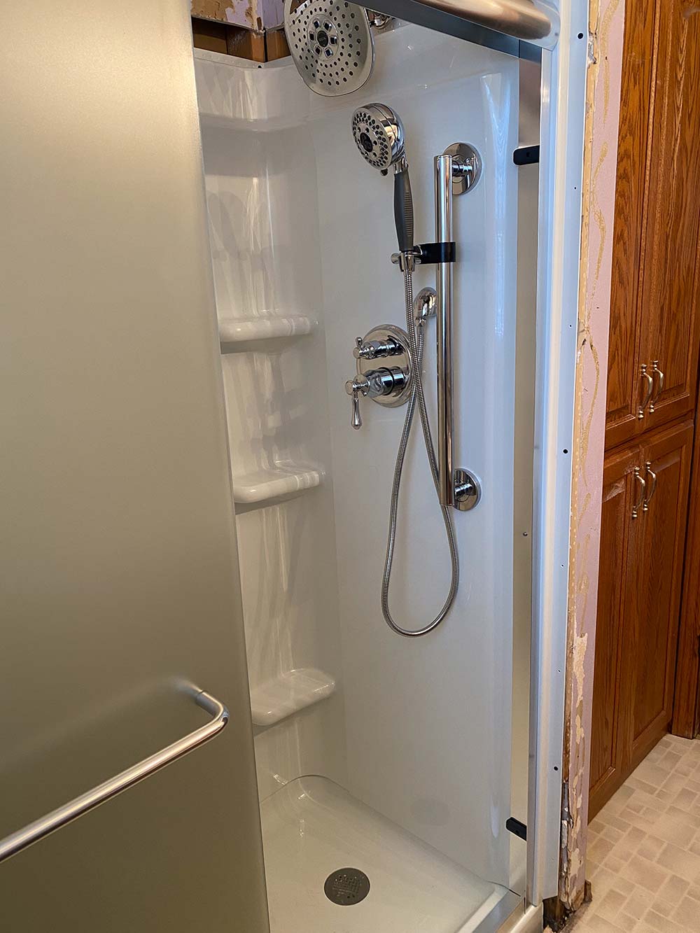 RJ Parins Plumbing & Heating in Green Bay WI insalled a clean standup shower.